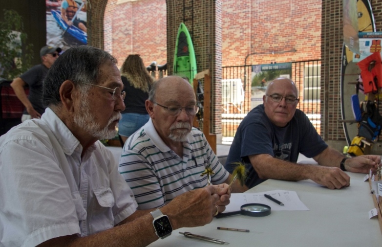Paul Domoto, Dave Rosset, and Keith Wunder Judging the Iowa State Fair Fly Tying  Competition